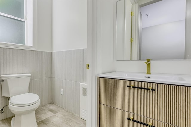21 Dale Rd, Monsey, NY 10952 - bathroom featuring toilet, radiator heating unit, vanity, and tile patterned flooring