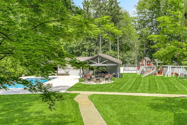 21 Dale Rd, Monsey, NY 10952 - view of yard with a playground, a patio area, and an outdoor pool