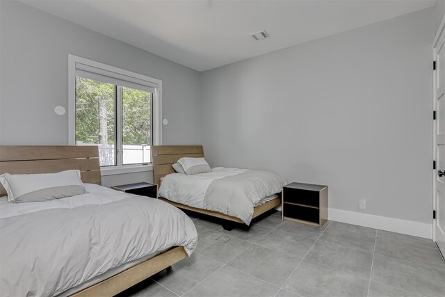 21 Dale Rd, Monsey, NY 10952 - tiled bedroom featuring baseboards