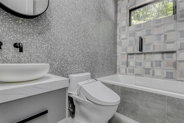 21 Dale Rd, Monsey, NY 10952 - full bathroom featuring vanity, toilet, tiled shower / bath, wallpapered walls, and tile patterned flooring