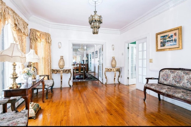 786 N Broadway, Yonkers, NY 10701 - sitting room with a chandelier, crown molding, and wood finished floors