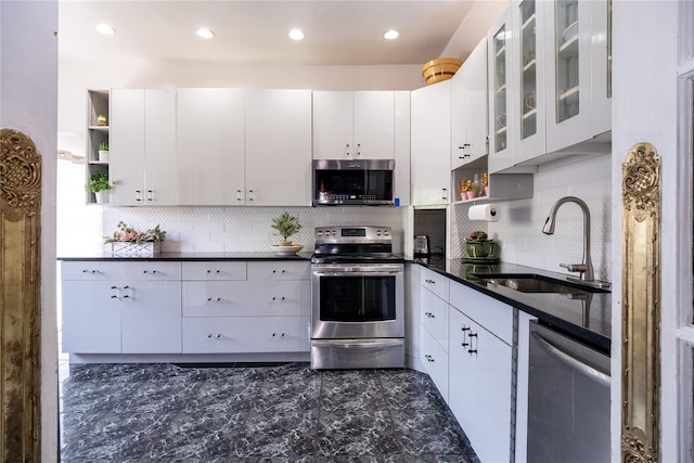 786 N Broadway, Yonkers, NY 10701 - kitchen featuring stainless steel appliances, a sink, open shelves, backsplash, and recessed lighting