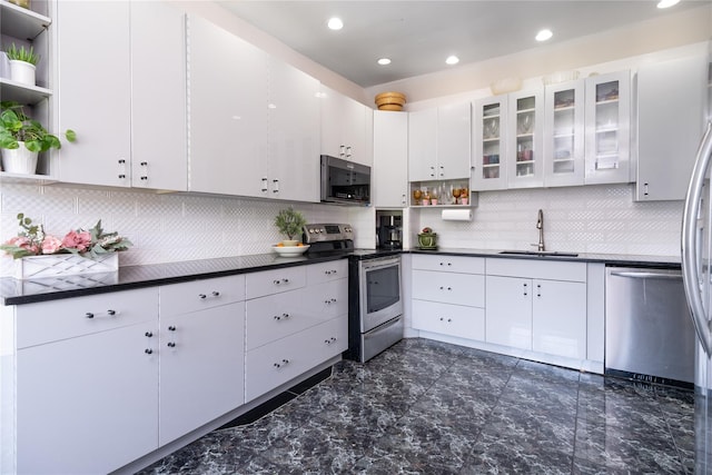 786 N Broadway, Yonkers, NY 10701 - kitchen featuring open shelves, stainless steel appliances, a sink, dark countertops, and recessed lighting