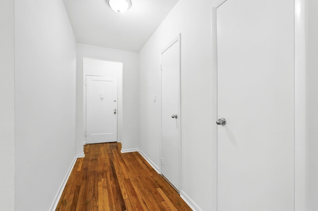 312 Main St Unit 4F, White Plains, NY 10601 - hallway featuring baseboards and dark wood-type flooring