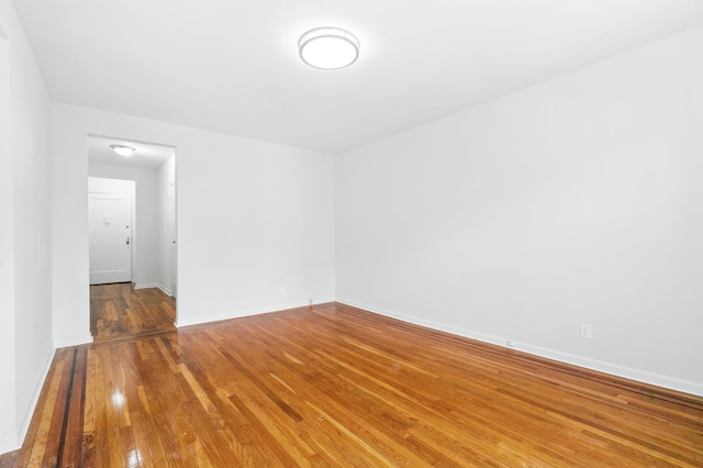 312 Main St Unit 4F, White Plains, NY 10601 - empty room with hardwood / wood-style flooring and baseboards