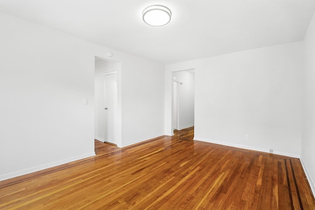 312 Main St Unit 4F, White Plains, NY 10601 - spare room featuring hardwood / wood-style flooring and baseboards