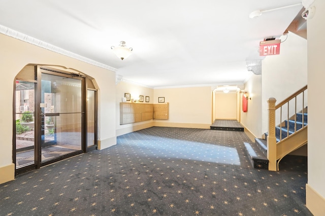 312 Main St Unit 4F, White Plains, NY 10601 - building lobby featuring crown molding and stairway
