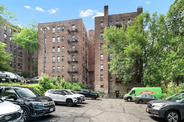 312 Main St Unit 4F, White Plains, NY 10601 - view of apartment building / complex with uncovered parking