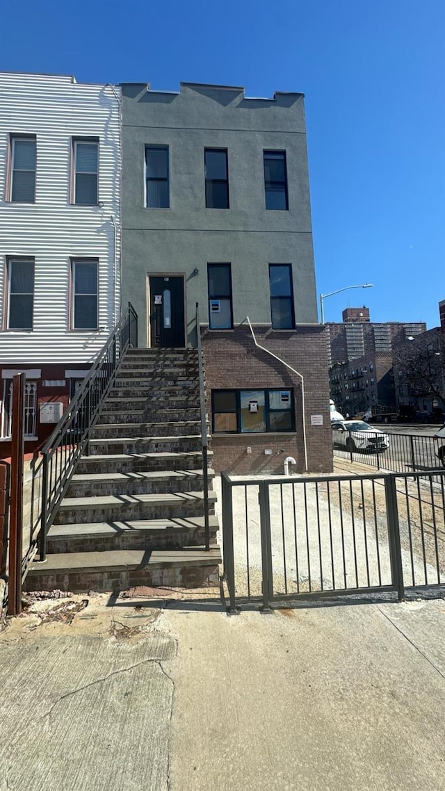 31 Roosevelt Pl, Brooklyn, NY 11233 - view of property featuring stairway