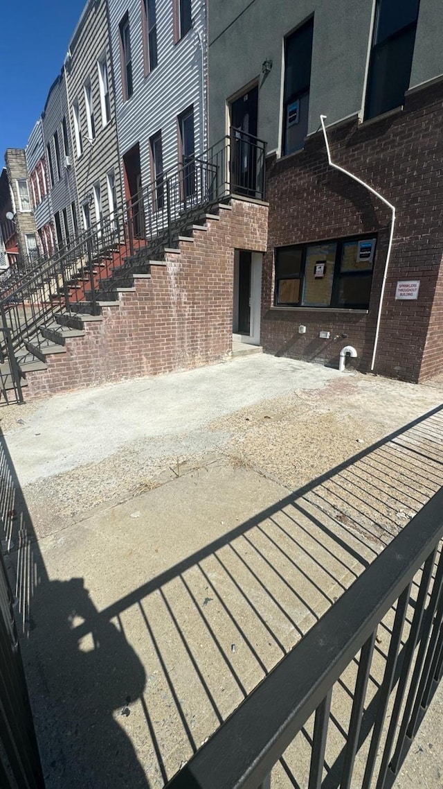 31 Roosevelt Pl, Brooklyn, NY 11233 - view of patio / terrace featuring a residential view