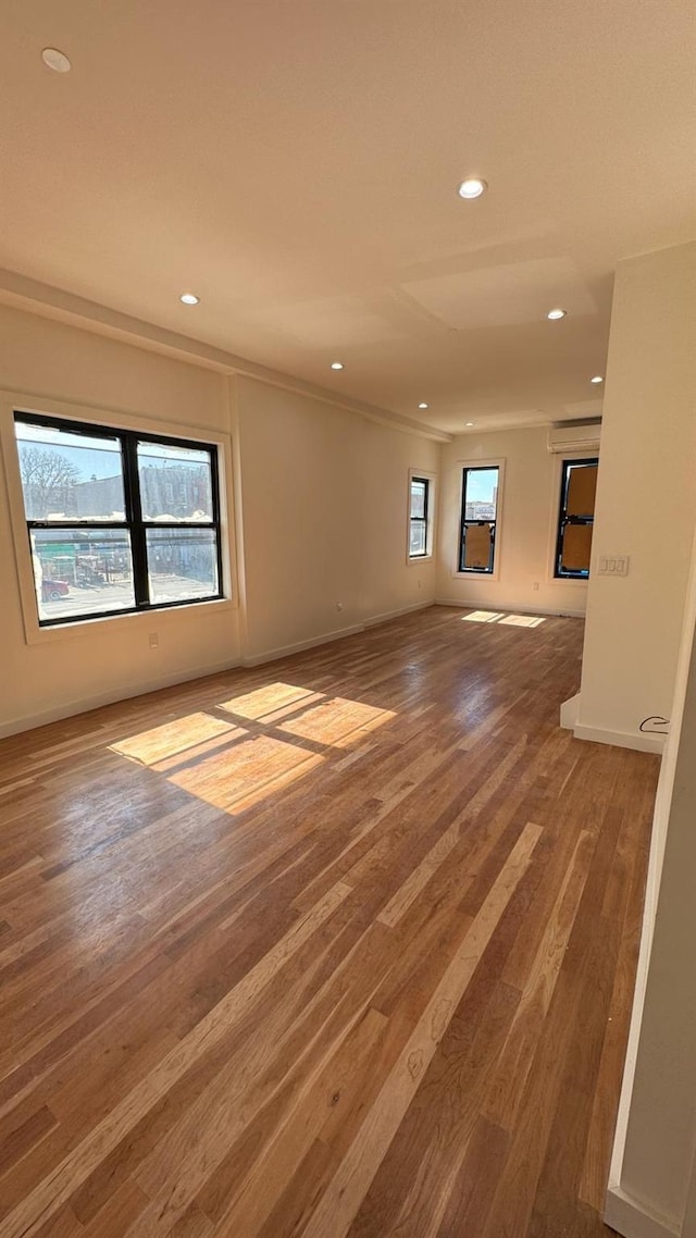 31 Roosevelt Pl, Brooklyn, NY 11233 - unfurnished room featuring recessed lighting and wood finished floors