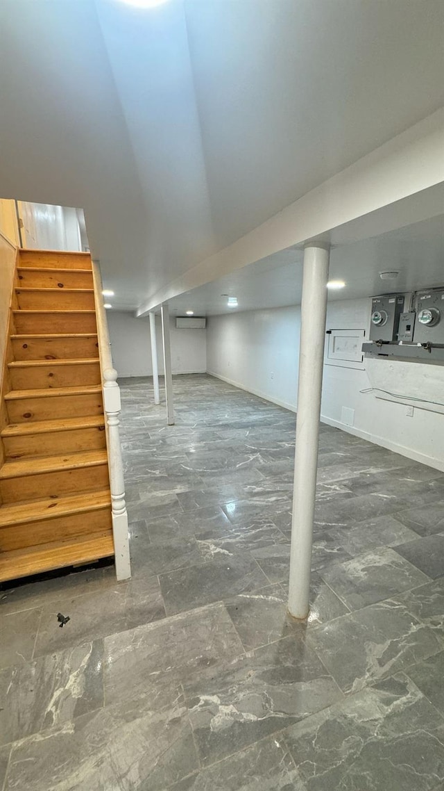 31 Roosevelt Pl, Brooklyn, NY 11233 - finished below grade area with stairs, marble finish floors, and washing machine and clothes dryer
