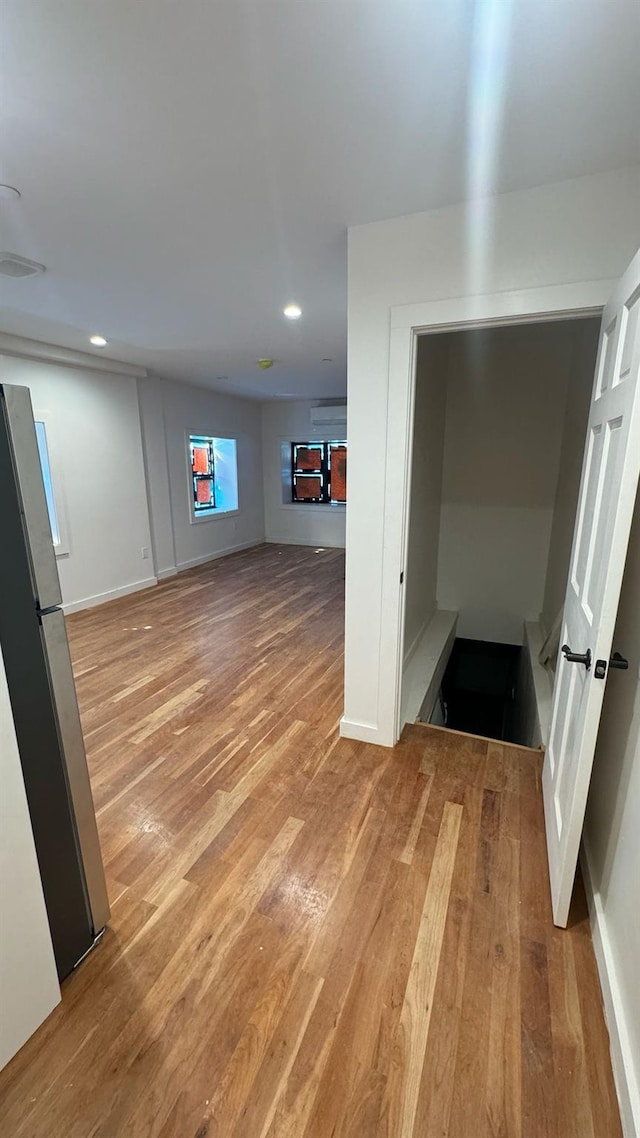 31 Roosevelt Pl, Brooklyn, NY 11233 - corridor featuring light wood-style flooring and recessed lighting