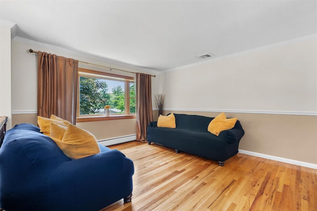 154 Meadow Lark Rd, Montgomery, NY 12549 - living room with a baseboard radiator, crown molding, wood finished floors, and baseboards