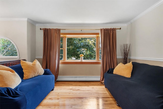 154 Meadow Lark Rd, Montgomery, NY 12549 - living area with a baseboard heating unit, plenty of natural light, ornamental molding, and light wood-type flooring