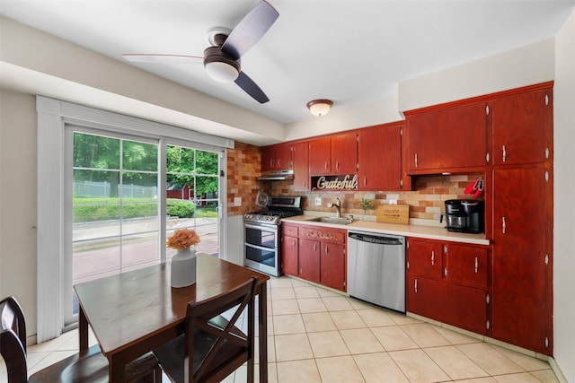 154 Meadow Lark Rd, Montgomery, NY 12549 - kitchen with appliances with stainless steel finishes, under cabinet range hood, tasteful backsplash, light countertops, and a ceiling fan