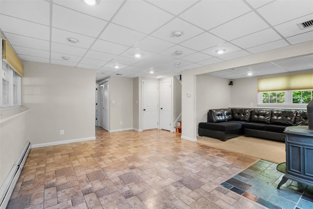 154 Meadow Lark Rd, Montgomery, NY 12549 - living room featuring a baseboard radiator, stairway, baseboards, and stone tile floors
