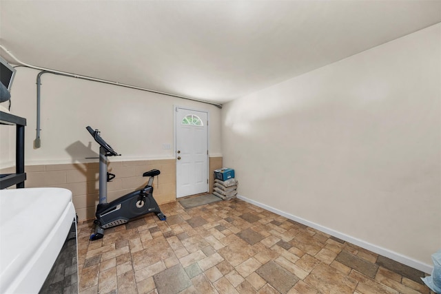 154 Meadow Lark Rd, Montgomery, NY 12549 - workout area with stone finish flooring and baseboards