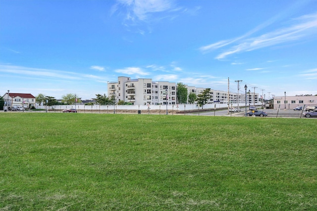 725 Miller Ave Unit 134, Freeport, NY 11520 - surrounding community with a lawn