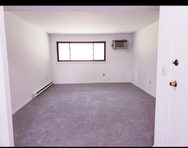 20 Pierces Rd Unit 61, Newburgh, NY 12550 - unfurnished room with baseboard heating, a wall unit AC, carpet floors, and baseboards