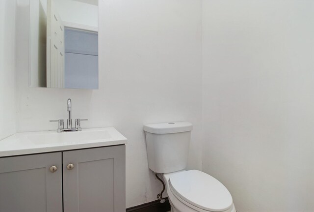 16 Sampson Ave, Islandia, NY 11749 - half bathroom with toilet and vanity