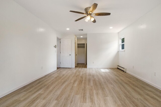 16 Sampson Ave, Islandia, NY 11749 - spare room featuring a baseboard radiator, a ceiling fan, light wood-type flooring, recessed lighting, and baseboards