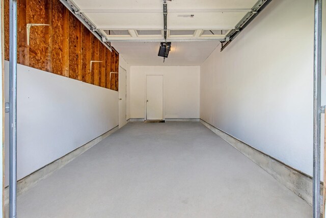 16 Sampson Ave, Islandia, NY 11749 - garage with a garage door opener