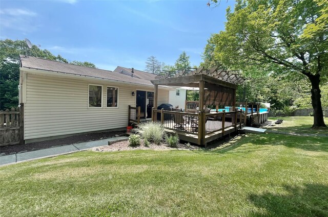 9 Hickory St, Highland Mills, NY 10930 - rear view of property featuring a pergola and a wooden deck