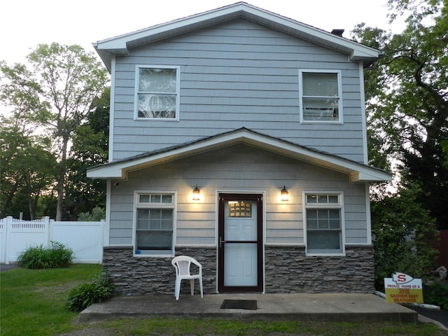 55 Blossom Ave, Holtsville, NY 11742 - view of front of house with stone siding