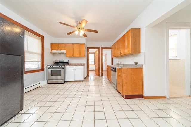 124-01 9th Ave, College Point, NY 11356 - kitchen with appliances with stainless steel finishes, under cabinet range hood, light countertops, and ceiling fan