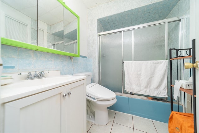 124-01 9th Ave, College Point, NY 11356 - bathroom featuring toilet, vanity, tile patterned floors, and shower / bath combination with glass door