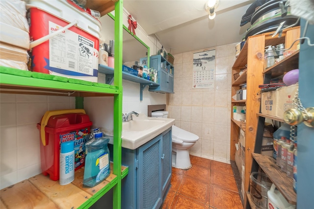 124-01 9th Ave, College Point, NY 11356 - bathroom featuring tile walls, vanity, toilet, and tile patterned floors
