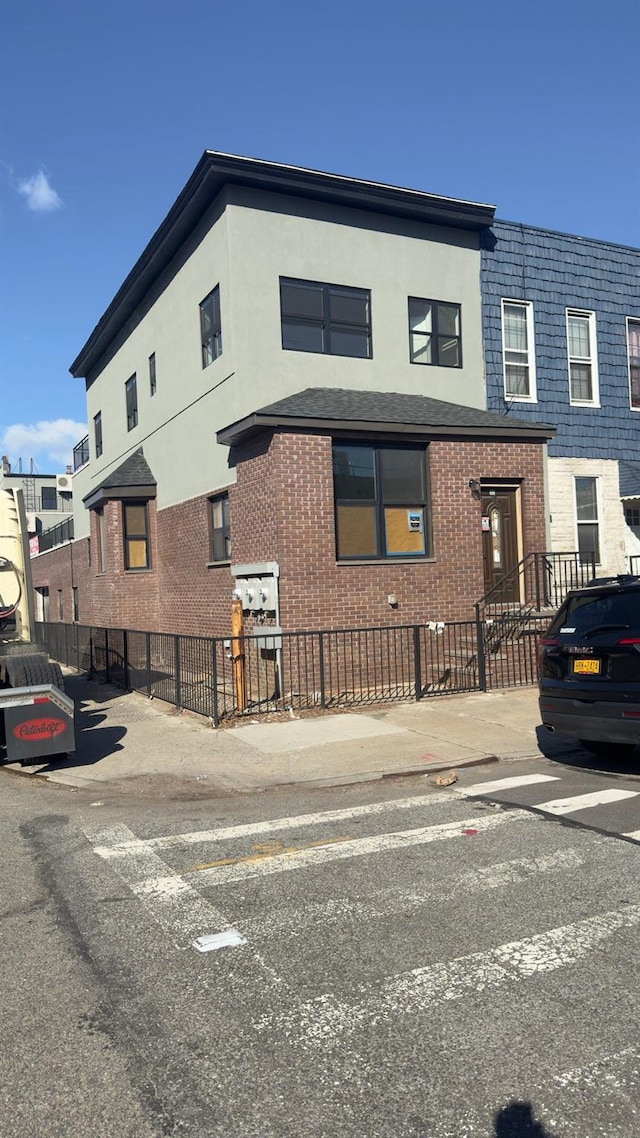 32 Radde Pl, Brooklyn, NY 11233 - view of front of property featuring brick siding