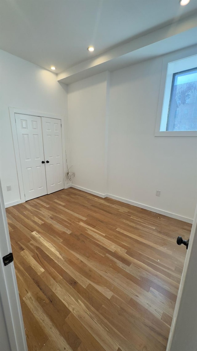 32 Radde Pl, Brooklyn, NY 11233 - below grade area featuring recessed lighting and wood finished floors
