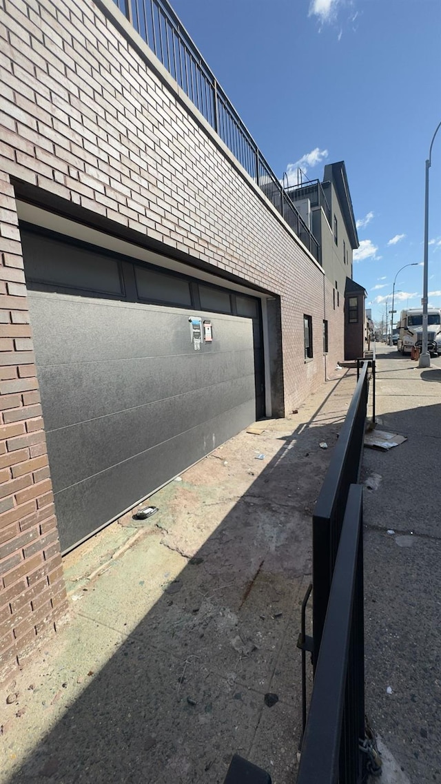 32 Radde Pl, Brooklyn, NY 11233 - view of side of home with brick siding