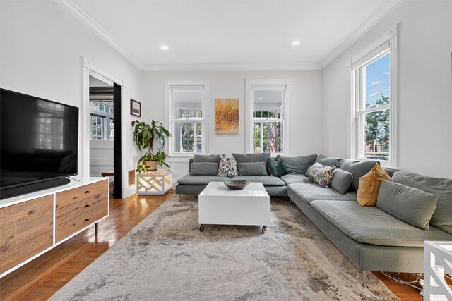 235 Ringgold St, Peekskill, NY 10566 - living area with plenty of natural light, crown molding, wood finished floors, and recessed lighting