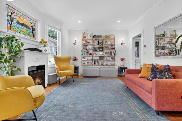 235 Ringgold St, Peekskill, NY 10566 - living area with a glass covered fireplace, wood finished floors, ornamental molding, and recessed lighting