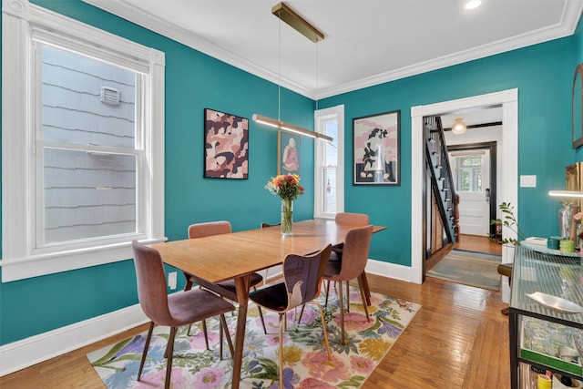 235 Ringgold St, Peekskill, NY 10566 - dining space featuring wood finished floors and ornamental molding
