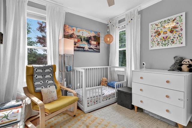 235 Ringgold St, Peekskill, NY 10566 - bedroom featuring ornamental molding and a nursery area
