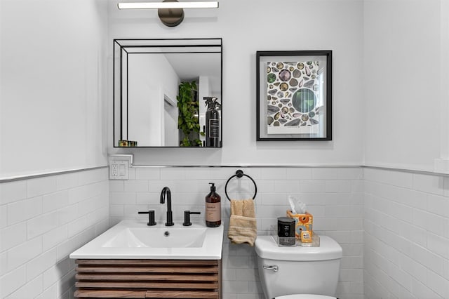 235 Ringgold St, Peekskill, NY 10566 - bathroom with tile walls, vanity, and wainscoting