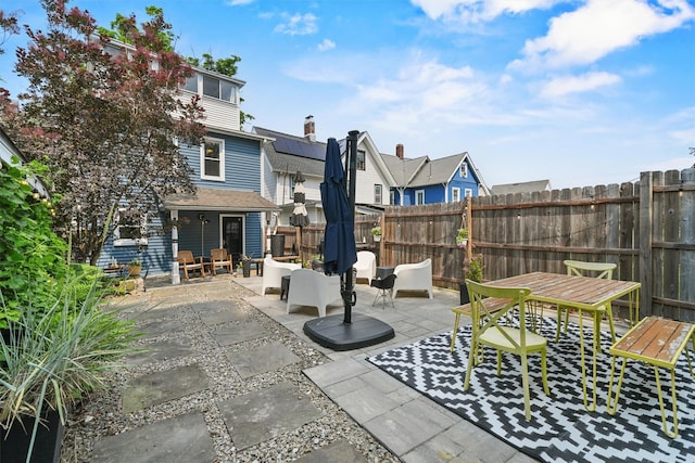 235 Ringgold St, Peekskill, NY 10566 - view of patio / terrace featuring outdoor dining space, an outdoor hangout area, and a residential view