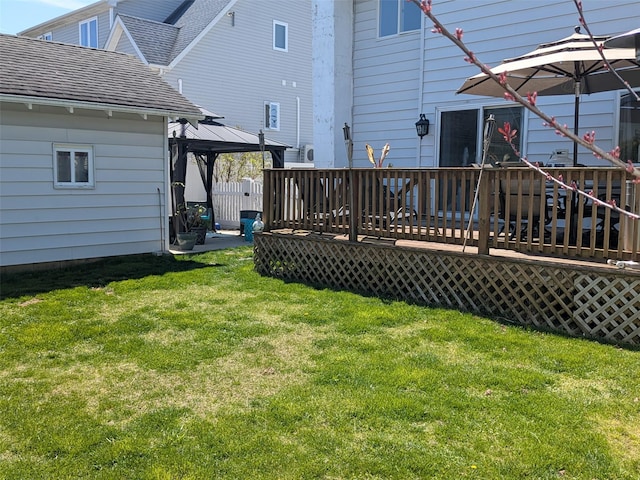 3403 Bay Front Dr, Baldwin, NY 11510 - back of property featuring a gazebo, a deck, a yard, and roof with shingles