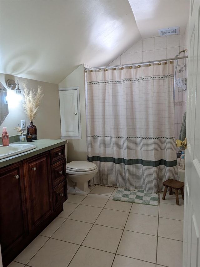 3403 Bay Front Dr, Baldwin, NY 11510 - bathroom featuring vaulted ceiling, vanity, toilet, tile patterned floors, and a shower with curtain