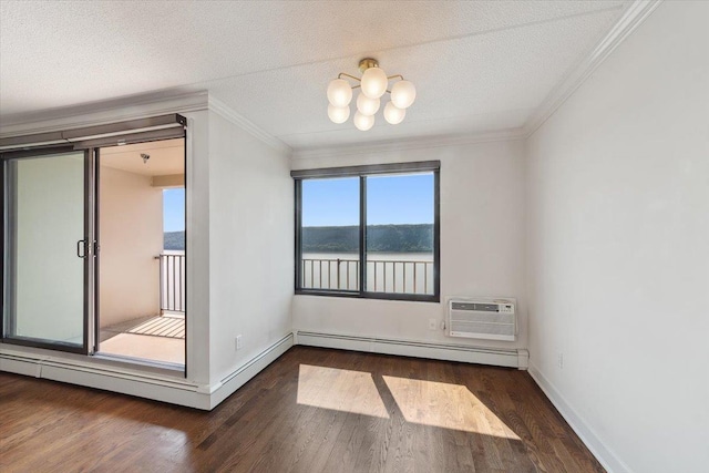 1155 Warburton Ave Unit 12U, Yonkers, NY 10701 - empty room featuring crown molding, wood finished floors, a wall mounted AC, a chandelier, and baseboards
