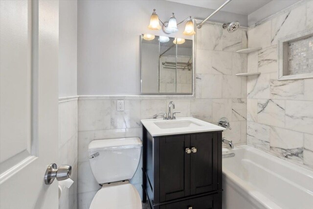 1155 Warburton Ave Unit 12U, Yonkers, NY 10701 - bathroom with vanity, shower / tub combination, toilet, and tile walls