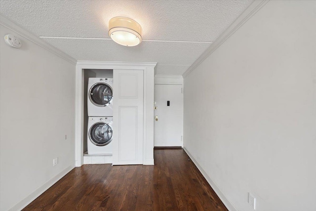 1155 Warburton Ave Unit 12U, Yonkers, NY 10701 - laundry area featuring estacked washer and dryer, a textured ceiling, wood finished floors, baseboards, and ornamental molding