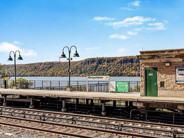 1155 Warburton Ave Unit 12U, Yonkers, NY 10701 - view of community with covered parking, a view of trees, and a water view