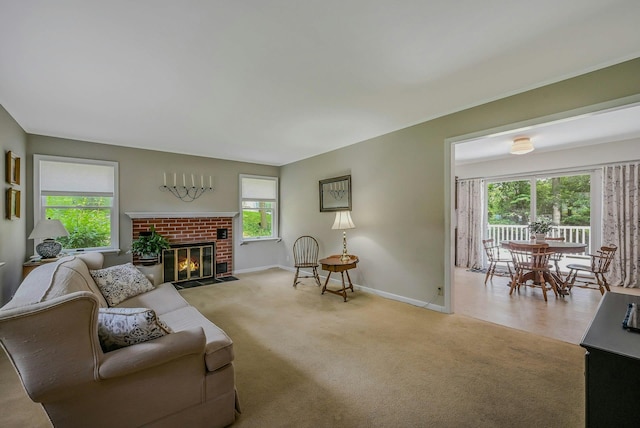 39 Dartmouth Rd, Shoreham, NY 11786 - living room featuring carpet floors, baseboards, and a fireplace