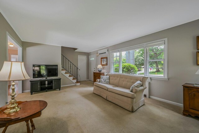 39 Dartmouth Rd, Shoreham, NY 11786 - living area with a wall mounted AC, stairway, carpet floors, baseboards, and crown molding