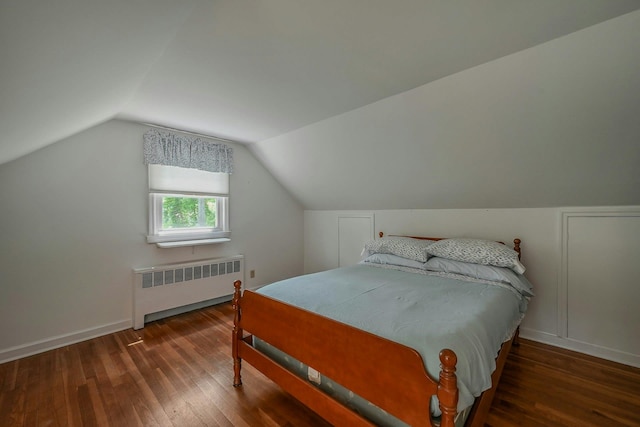 39 Dartmouth Rd, Shoreham, NY 11786 - bedroom featuring radiator, hardwood / wood-style floors, and lofted ceiling